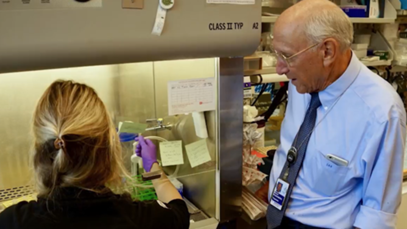 Dr. Steven Rosenberg and a colleague in the lab at the NCI Surgery Branch